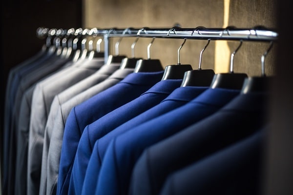 Suits on clothes rail